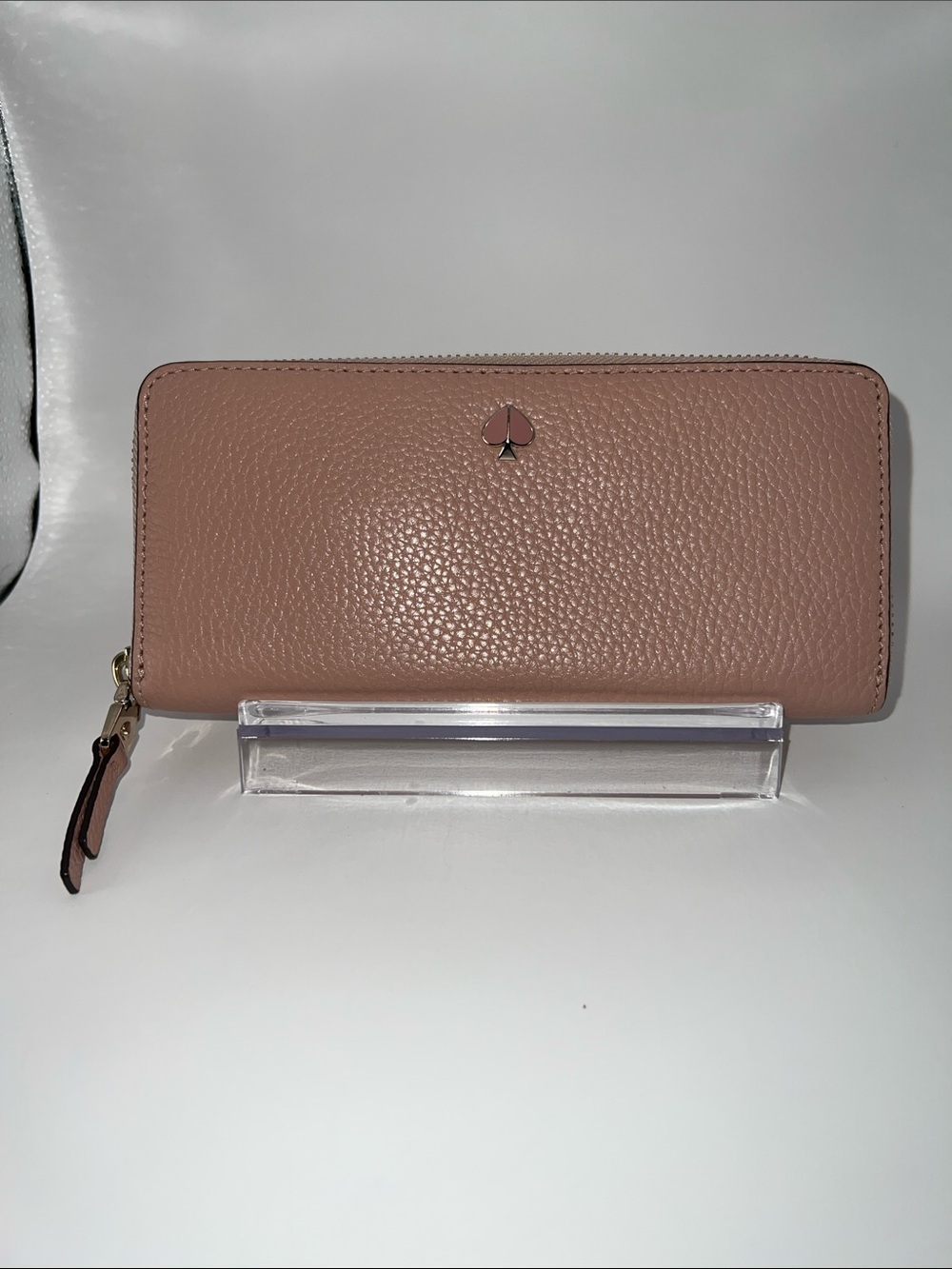 kate spade pebbled zip-around wallet in dusty rose